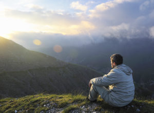 Man reflecting on joy and sorrow