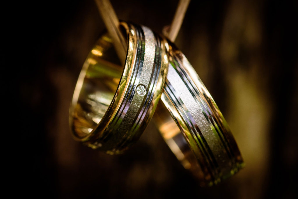 Gold marriage rings on string