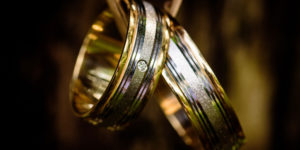 Gold marriage rings on string