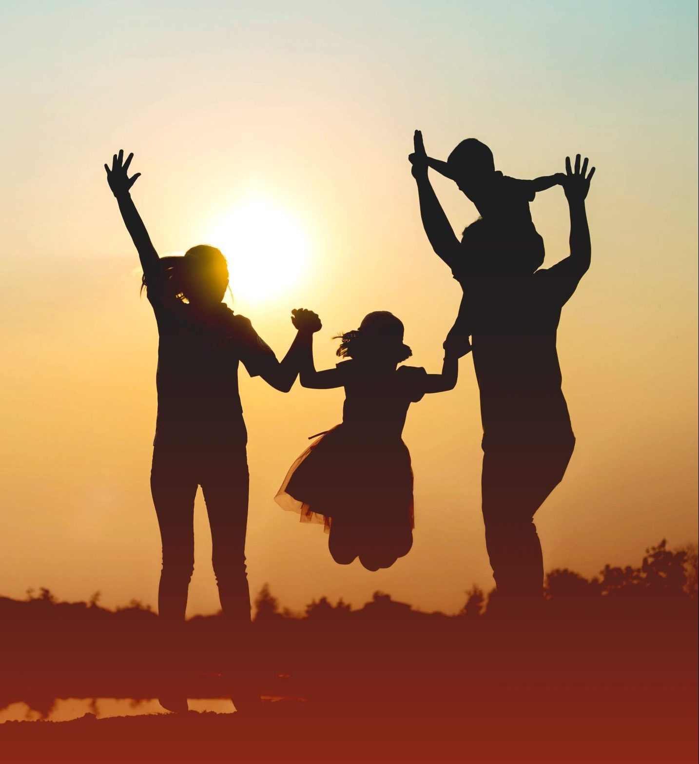Silhouette of a family comprising a father, mother and two child